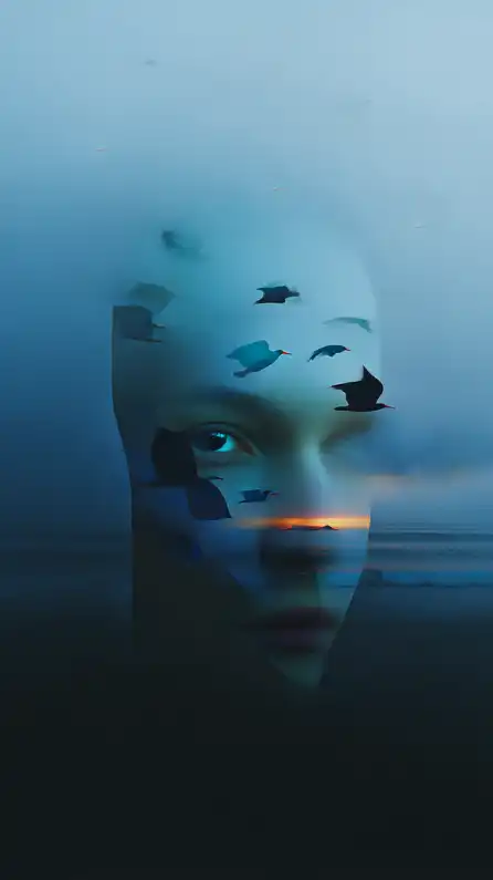close up shot of a face, background with birds in the air flying over the ocean horizont at dawn