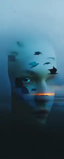 close up shot of a face, background with birds in the air flying over the ocean horizont at dawn