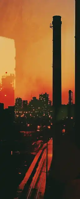 a city skyline and a cypherpunk